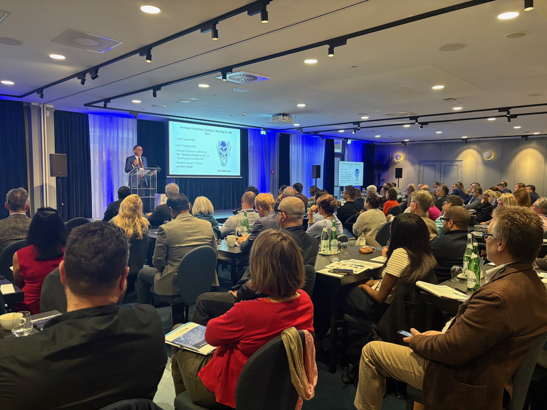 Dr. Morgentaler presenting to a full auditorium of clinicians at a T4L Education congress