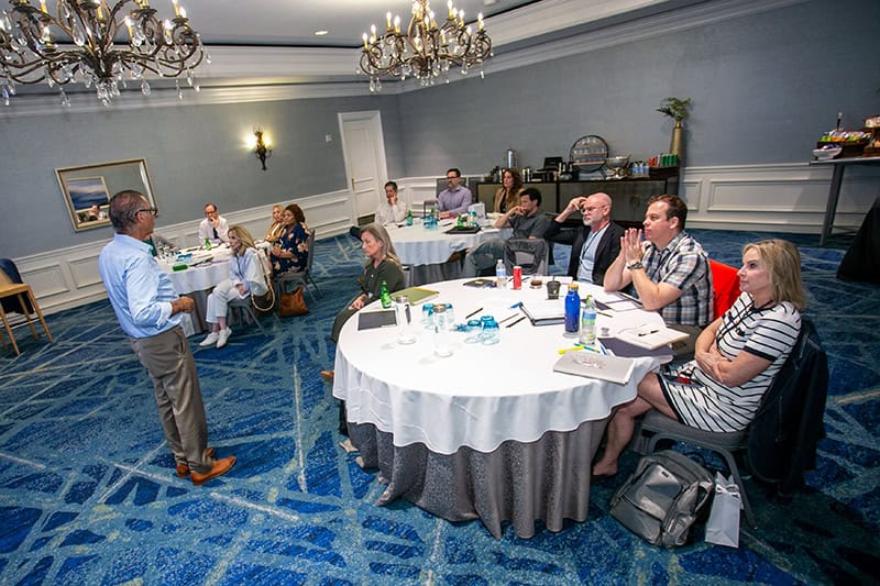 Clinicians seated for case discussion during a T4L Masterclass